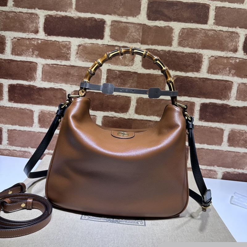 G*u*i top handle bags